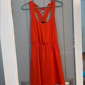 Sleeveless summer dress with back strap details